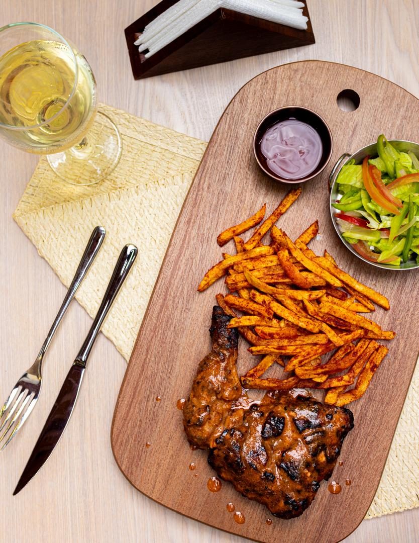 Braai chicken plate with masala chips