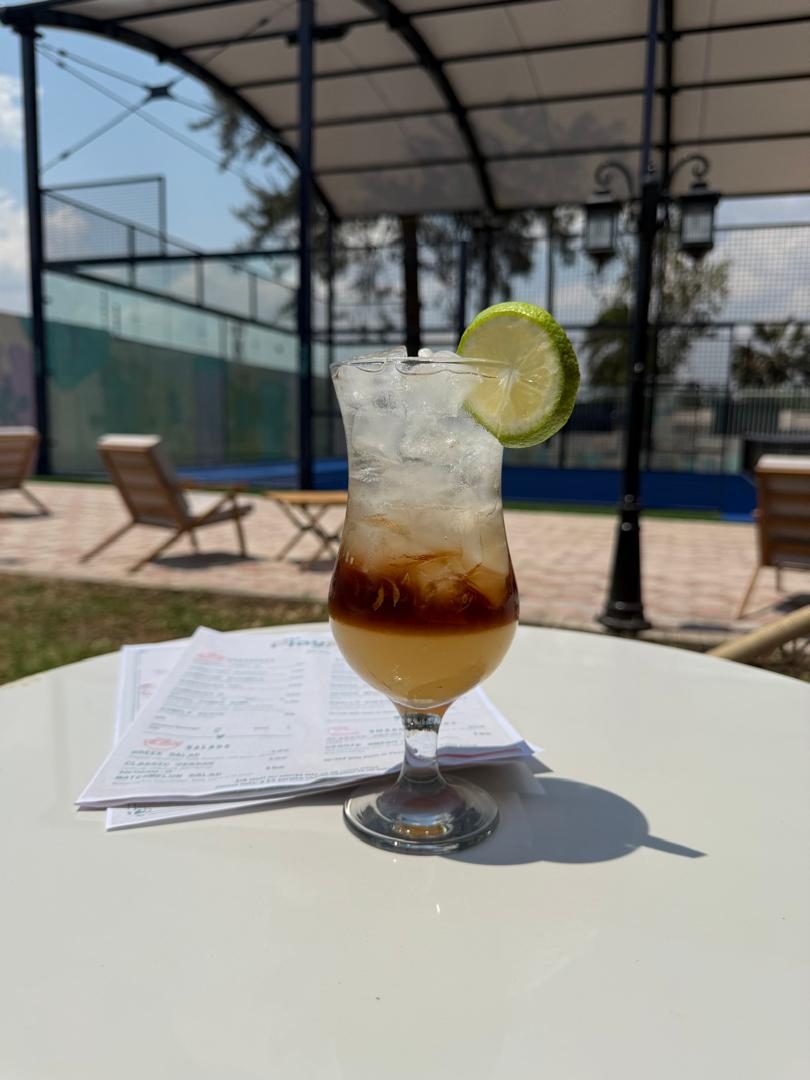 Cocktail overlooking the padel court